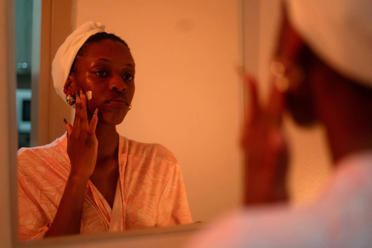 cosmetic essential mirror with LED lighting on a vanity table showing accurate skin tone reflection